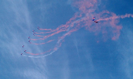 The first to land unfurls a Union flag