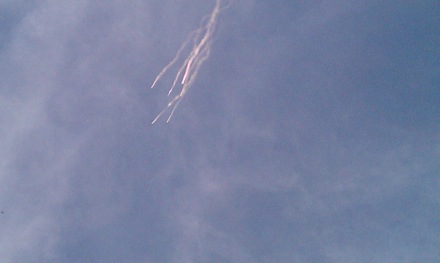 Parachutists light their smoke