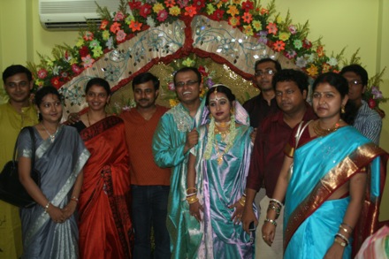 With all the friends of Sourav with their wives.