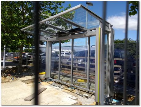 bus stop, steel, metallurgy, lift, flowers, Darwin College, Harry Bhadeshia