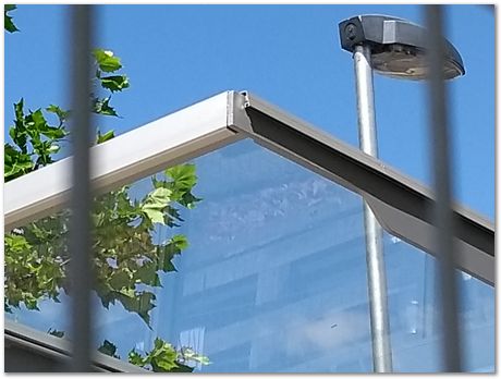 bus stop, steel, metallurgy, lift, flowers, Darwin College, Harry Bhadeshia