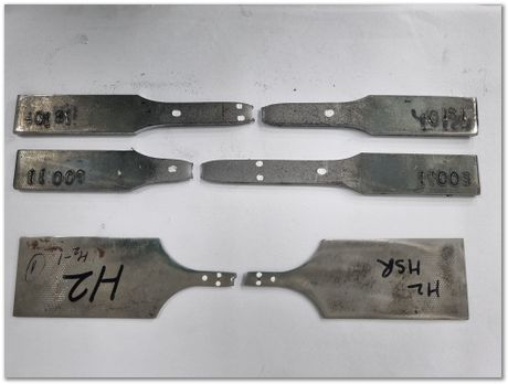 Broken tensile test samples from low carbon steel, Apparao Chinta, Harry Bhadeshia