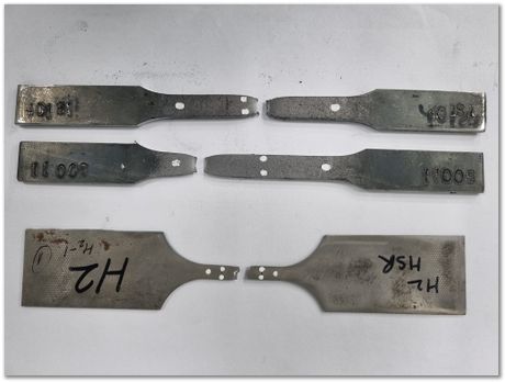 Broken tensile test samples from low carbon steel, Apparao Chinta, Harry Bhadeshia