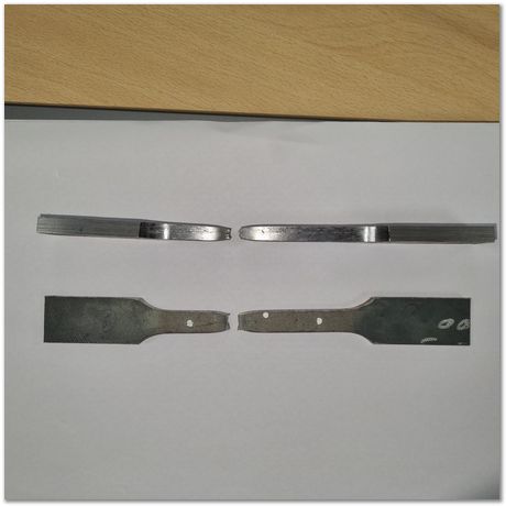 Broken tensile test samples from low carbon steel, Apparao Chinta, Harry Bhadeshia