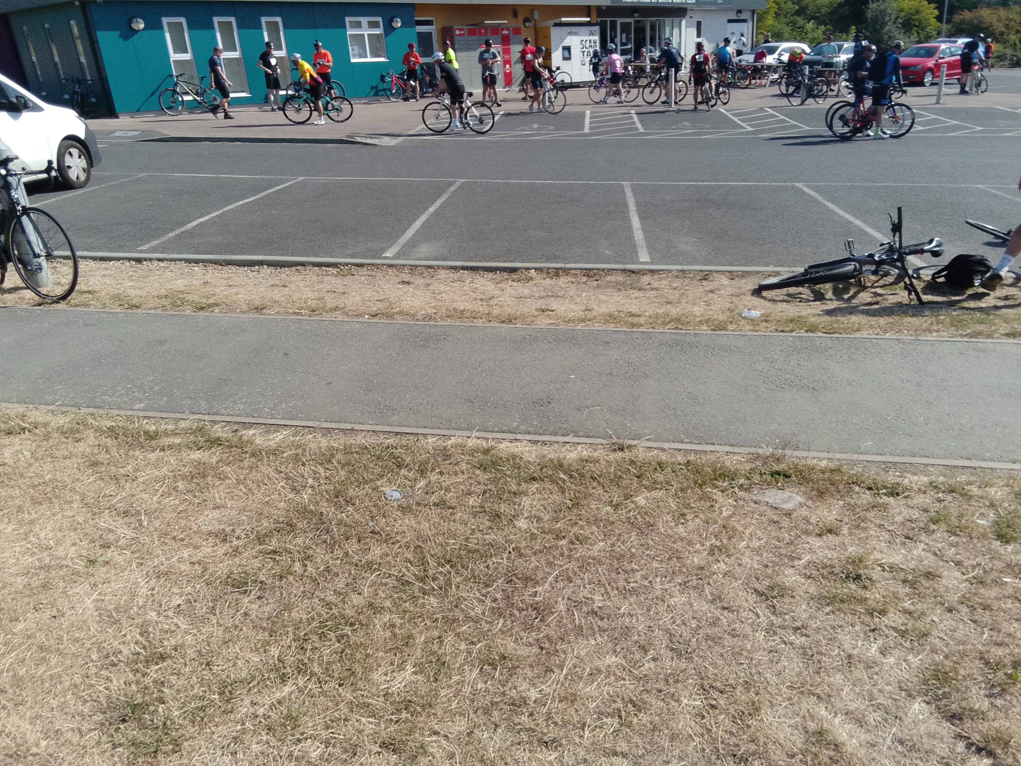 Cyclists gathering at starting lot